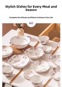 Detail of floral ceramic tableware set including bowls and plates with lavender patterns