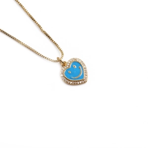 Gold-plated heart pendant necklace with blue enamel smiley face and sparkling zircons