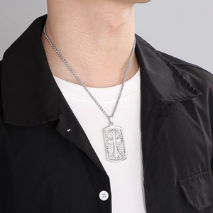 Men's silver square dog tag necklace with embossed cross on a twisted metal chain