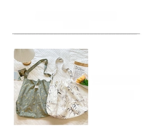 Detailed view of polyester tote bags with ethnic paisley and ink bamboo leaf prints