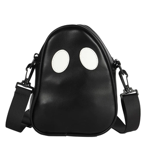 Detail of cute black ghost crossbody bag with white eye patches and nylon strap