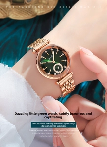Macro detail of rose gold watch with emerald green sunray dial and crystal hour markers