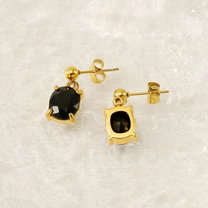 Oval gold-plated stainless steel earrings featuring black cubic zirconia and butterfly back