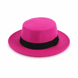 Classic magenta flat top wool felt hat with black ribbon, professional side view