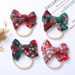 Set of 4 Christmas baby headbands with plaid bows and festive snowflake patterns