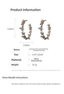 Detail showing oversized rhinestone butterfly hoop earring dimensions 5.5 by 5.2 cm