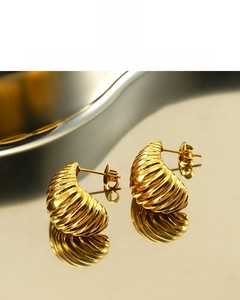 Detail of 18K gold plated croissant earrings with vacuum plating and 365 days color retention