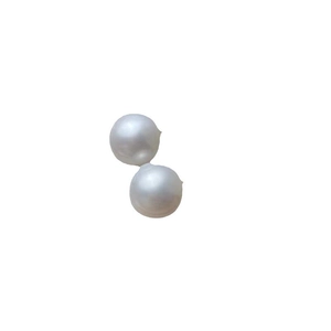 Pair of glossy white pearl stud earrings with sterling silver needles on white background