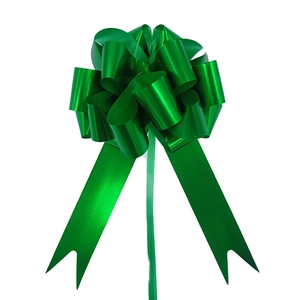 Close-up of a 3D spherical green gift bow made of aluminized film for gift packaging