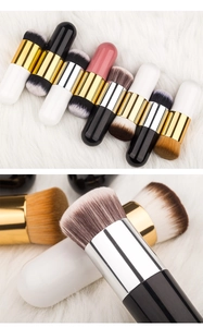 Macro detail of high-density bristles on short-handle foundation and blush makeup brushes