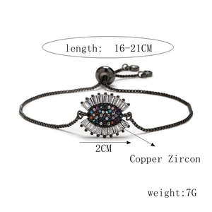 Adjustable copper gold-plated bracelet with evil eye motif and multicolor zircons