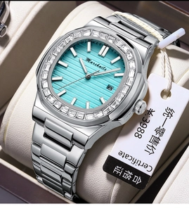 Detail of Tiffany blue watch dial with silver stainless steel case and stone bezel