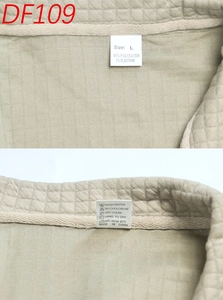 Detail of L size label and wash care tag for men waffle knit zip cardigan in khaki