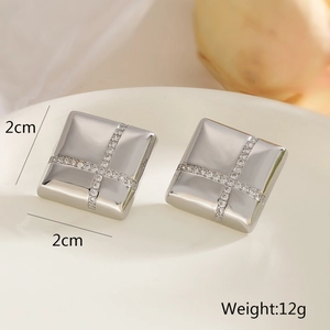 Detail view of square silver geometric earrings with zircon inlay showing 2cm dimensions