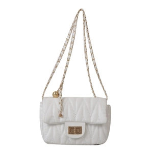 Elegant white quilted crossbody bag with golden chain strap and V-pattern stitching