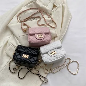 Quilted chain shoulder bag in pink, black, and white with elegant gold metal lock
