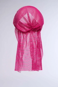 Detail of fuchsia mesh turban with sparkling rhinestones and elegant draped fabric texture