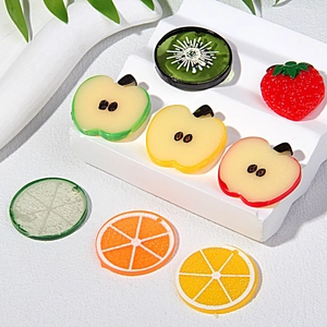 Lot d'accessoires cheveux en forme de tranches de fruits comme le citron et le kiwi