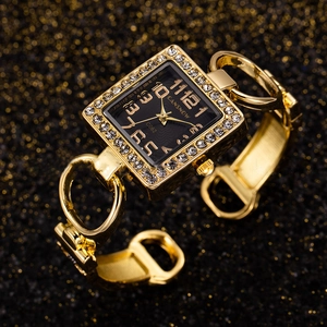 Elegant gold cuff watch for women with square black dial and crystal bezel design