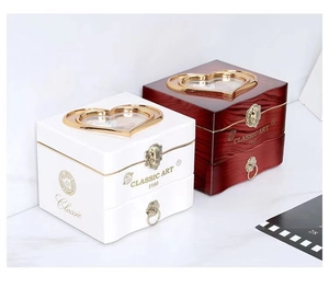 Classic double-heart music box with dancing girl and glossy red and white jewelry storage