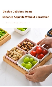 Top view of colorful square ceramic snack bowls with a natural bamboo serving tray