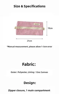 Close-up of pink star pattern pencil case with 21x10cm dimensions and zipper detail