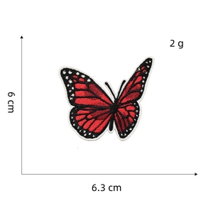 Detailed view of red butterfly embroidered patch with size dimensions 6cm by 6.3cm