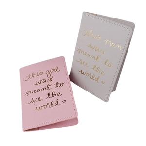 Pink and grey PU leather passport covers with gold airplane travel quotes in English