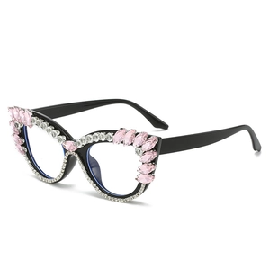 Black cat-eye glasses with sparkling pink marquis crystals and white rhinestones