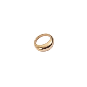 Detailed view of thick gold plated dome ring with polished mirror finish on white background