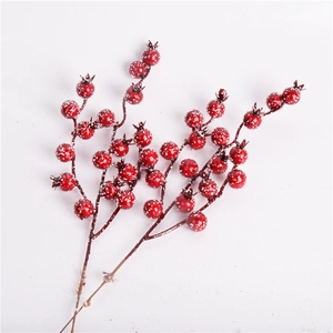 Artificial red Christmas berry picks with white snowy frost for DIY wreaths and trees