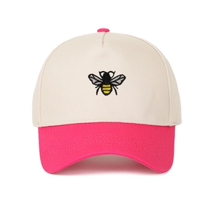 Detailed view of bee embroidery on a color-block baseball cap with contrast brim