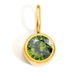 Detail of a round green birthstone pendant with a faceted cut in a golden metal base