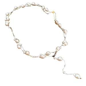 French vintage style Y-shaped long necklace with irregular white pearls and gold metal chain