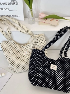 Polka dot canvas tote bags in black and white styles with sozakka beaute label