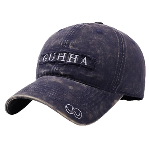 Vintage navy blue washed cotton baseball cap with GUHHA embroidery and distressed texture