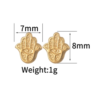 Detailed size specifications for gold Hamsa hand stud earrings measuring 7mm by 8mm