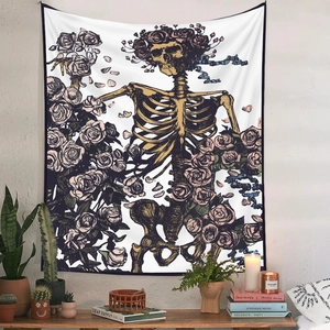 Detailed view of skull and rose vintage tapestry hanging on a wall with interior decor