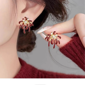 18k gold plated firework stud earrings with red enamel and sparkling zircons