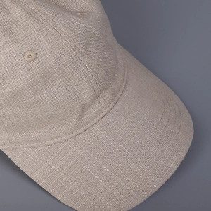 Linen baseball cap in beige with breathable embroidered eyelets and reinforced stitching