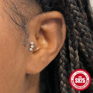 S925 sterling silver three-diamond stud earring for helix piercing on model