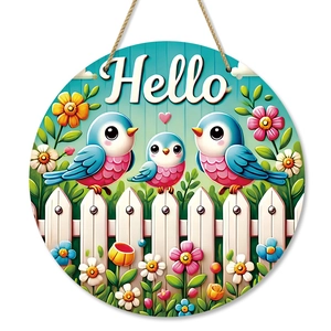 Rustic wooden Welcome sign featuring blue birds and spring flowers with hanging rope