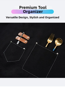 Close-up of black canvas apron pockets with rivets and leather loops for tools