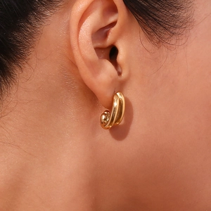 18K gold plated stainless steel double layer banana stud earrings on female ear