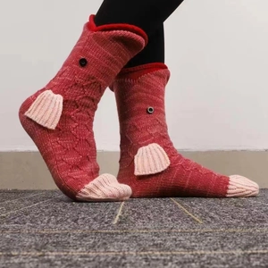 Creative knit crocodile socks in red and pink with button eye details and 3D fins