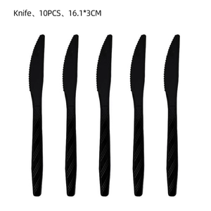 Detail view of 10 pieces black plastic soccer party knives measuring 16.1x3cm size