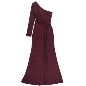 Detail of burgundy one-shoulder maxi dress featuring elegant waist pleats and slim fit cut