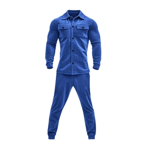Detail of blue corduroy texture and pocket design on men's casual two-piece jacket set