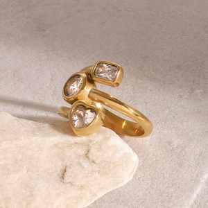 Polished gold stainless steel ring with heart and rectangle zircon on stone
