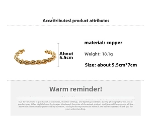 Detail view of gold twisted cuff bracelet with dimensions 7cm diameter and copper material